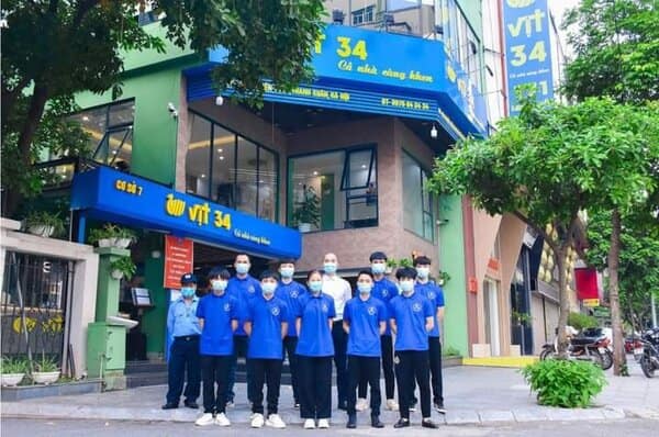 Áo đồng phục cổ trụ màu xanh dương nổi bật cho nhân viên phục vụ
